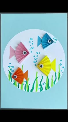 an image of paper fish on a plate