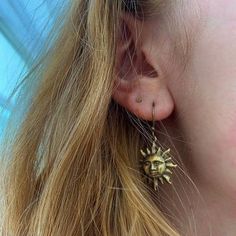 Antiqued brass SUN pendants (20mm) have a have a happy face and french hook ear wires. (Happy buyers modeling their new earrings in the last pics.) These earrings measure one and 1/2 inches in length.... Larger size available here: https://www.etsy.com/listing/51529403/larger-size-sun-face-earrings-brass See more of my designs here; justEARRINGS.etsy.com And please visit my sister~shops; justCHARMING.etsy.com & BohoDreamJewelry.etsy.com All of my jewelry shops offer FREE SHIPPING! Highlights Sun Earrings, Sun Face, Face Earrings, New Earrings, Happy Face, Pretty Jewellery, Smile Face, My Sister, Ear Wires