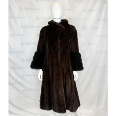 DESIGNER Day Furs  COLOR Brown / Black MATERIAL Mink / Rabbit SIZE Size Tag Removed Estimated Size Small MEASUREMENTS Length: 42 in. Sleeve Length: 21.5 in.  Shoulder Width: 20 in. Bust: 17 in. DETAILS Brown mink Black fur cuffs Three front hook & eye closures Two side pockets Dark brown satin lining 'DDN' monogram on lining CONDITION Gently used, normal signs of wear throughout. Minor pulls & small marks on lining. *Clothing sizes may vary based on designer and style. Please note that pre-owned Classic Formal Fur Coat, Classic Brown Fur Coat For Formal Occasions, Black Fur Coat, Fur Cuffs, Style Dark, Brown Satin, Hook Eye, Measurement Length, Size Tag