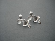 beautiful earrings made with matte white gold plated double orchid flowers connected to sterling silver post earrings measures 15mm x 23mm matching necklaces; https://www.etsy.com/listing/183788750/ready-to-ship-bridesmaids-gift-wedding https://www.etsy.com/listing/170268128/ready-to-ship-bridesmaids-gift-wedding https://www.etsy.com/listing/170273046/bridesmaids-gift-wedding-gift-birthstone https://www.etsy.com/listing/62804263/triple-orchid-flowers-necklace-white https://www.etsy.com/listing/6 Silver Minimalist Flower Earrings For Wedding, Minimalist Silver Flower Earrings For Wedding, Silver Petal Flower Earrings For Wedding, Bridesmaid Earrings Silver, Orchid Flowers, Etsy Bridesmaid Gifts, Coin Pearls, Necklace White, Post Wedding