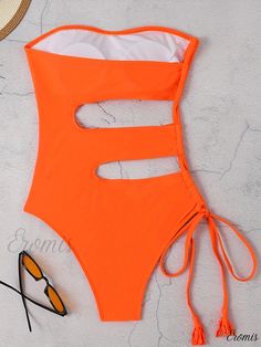 Eromis - Tangerine Cut Out Tassel One Piece Swimsuit: Bandeau Style with Tie-Side Detail, Premium Stretch Fabric, Elegant Solid Color - Womens Swimwear & Clothing Strapless Beachwear Bodysuit For Beach, Summer Strapless Bodysuit For Beach, Solid Bandeau Bodysuit For Beach, Summer Bandeau Bodysuit For Beachwear, Strapless Beach Bodysuit For Spring, Strapless Bodysuit For Beach In Spring, Orange Strapless Swimwear For Swimming, Orange Beach Bodysuit, Orange Beachwear Bodysuit For Beach