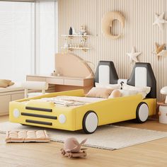 a child's bedroom with a yellow car bed