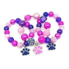 These adorable bracelets are the perfect favor for your little one's paw themed party! Each bracelet features a pink or purple enameled paw charm, resin rhinestone beads and an assortment of pink, purple and hot pink 10mm acrylic beads strung with durable stretch floss cord. Each bracelet comes individually packaged in organza bags. Please message me if you have any questions or if you would like to make some changes to this item. To be the first to know about new items, sales and giveaways, mar Personalized Pink Novelty Bracelets, Personalized Pink Novelty Charm Bracelet, Novelty Pink Stretch Bracelet For Birthday, Pink Novelty Stretch Bracelet For Birthday, Adjustable Purple Charm Bracelet For Birthday, Playful Pink Charm Bracelet For Birthday, Pink Novelty Bracelets For Party Favors, Cute Purple Bracelets For Birthday, Pink Bracelets With Round Beads For Party Favors