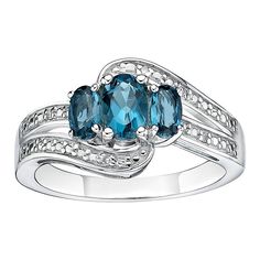 This sterling silver London blue topaz and diamond accent ring is a must-add to your fine jewelry collection. This sterling silver London blue topaz and diamond accent ring is a must-add to your fine jewelry collection. Width: 10 mm Metal: sterling silver Plating: rhodium Finish: polished Packaging: boxedSTONE DETAILS Stone type: London blue topaz Total weight: 5/8 ct. Center stone size: 6 mm x 4 mm Shape: oval Setting: prongDIAMOND DETAILS Total weight: less than 1/10 ct. Shape: round Setting: Blue Topaz Ring With Center Stone In Sterling Silver, Blue Topaz Ring With Accent Stones In Sterling Silver, Silver Blue Topaz Multi-stone Ring, Blue Diamond-cut Topaz Ring In Sterling Silver, Mothers Ring, Oval Setting, Luxury Sapphire-colored Topaz Ring In Sterling Silver, Blue Gemstone Rings, Lion Images