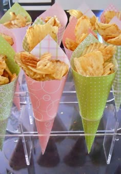 an image of some food in cones on the table