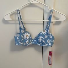 Never Worn And In Perfect Condition. So Cute And Light Blue With Daisies. Vacation Beach Bra With Built-in Support, Summer Underwire Bra For Vacation, Summer Beach Bra With Floral Print, Blue Summer Bra For Poolside, Summer Poolside Blue Bra, Blue Bra For Poolside And Summer, Floral Print Underwire Bra For Beach, Beach Season Bra For Pool, Floral Print Underwire Bra