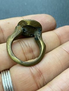 Unique Old ancient bronze signet ring intaglio collectible ring Antique Engraved Open Metal Ring, Antique Bronze Hand Cast Ring, Antique Handmade Bronze Rings, Antique Open Signet Ring Collectible, Antique Hand Cast Brass Ring, Antique Hand-cast Brass Rings, Handmade Bronze Rings For Collectors, Vintage Bronze Hand Cast Ring, Hand-cast Bronze Round Ring