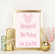 a pink and gold mickey mouse birthday sign with the words,'happiest birthday on earth '