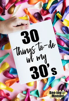 someone holding up a sign that says 30 things to do in my 30's