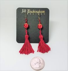 Earrings made of  red glass Swarovski pearls red Swarovski crystals red fiber tassels goldplate accents goldplate French hook earwires Handmade, one-of-a-kind Free gift box included Red Tasseled Jewelry As A Gift, Red Tasseled Jewelry For Gift, Red Dangle Tassel Earrings As Gift, Red Dangle Tassel Earrings For Gift, Red Tassel Earrings For Gift, Red Tassel Drop Earrings Gift, Red Tassel Earrings With Latkans As Gift, Adjustable Red Jewelry With Tassels, Red Tassel Earrings With Latkans For Gifts