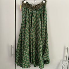 New With Tags Bohemian Skirt, Emerald Green With Gold/Brown Flowers. 80% Silk And 20% Rayon Traditional Skirt Bottoms For Beach, Traditional Skirt For Beach, Traditional Long Skirt For The Beach, Bohemian Relaxed Rayon Skirt, Bohemian Tiered Skirt In Rayon, Green Flared Skirt With Elastic Waistband, Bohemian Rayon Tiered Skirt, Bohemian Tiered Rayon Skirt, Beach Boho Print Long Skirt