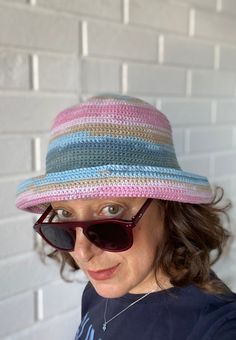 "Crochet bucket hat, knitted bucket hat, bucket hat for women, bucket hat for men, summer bucket hat, boho bucket hat, custom bucket hat This unisex crochet bucket hat is made with a premium cotton mix. It's a beautiful and stylish accesory for summer time; chic, soft and comfortable. It's a great sun visor in your daily use, at the beach and at fun places like summer festivals. The material is very soft and firm at the same time; fits very well and feels very comfortable on the head. It is so flexible that you can shape and use the brim differently as you wish. SIZE: S/M ------ * Circumference for head : 22-23 inches / 56-58.5 cm SHIPPING: -------------- * All the items in my shop goes with \"Free Shipment\" except some far away destinations. * I Usualy ship the ready items on following w Trendy Lightweight Bucket Hat With Short Brim, Casual Bucket Hat With Short Brim In Cotton Yarn, Casual Cotton Yarn Bucket Hat With Short Brim, Trendy Crochet Wide Brim Bucket Hat, Trendy Yarn Sun Hat With Curved Brim, Casual Cotton Yarn Bucket Hat, Casual Brimmed Cotton Bucket Hat, Casual Yarn Bucket Hat, Summer Bucket Hat With Curved Brim In Cotton Yarn