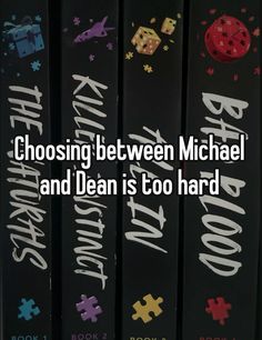 a row of black books with the words choosing between michael and dean is too hard