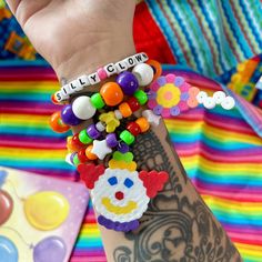 Clown kandi rainbow clowncore beaded bracelet set silly clown jewelry  Handmade clown bracelet set of 3 with clown and balloon perler charms  And alpha beads that read SILLY CLOWN Tags; clown jewelry clowncore rainbowcore kidcore rave fashion kandicore kandi beads pony beads Clown Kandi Bracelet, Playful Rainbow Beaded Bracelets, Clown Bracelet, Clown Kandi, Clown Fashion, Rave Kandi Ideas, Kandi Designs, Silly Clown, Kandi Singles