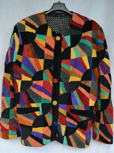 1980s-90s vintage leather bomber jacket, size M Colorful leather jacket in patchwork style Stylish, bright, original Brand: not specified. Size: M (check the measurements to make sure it fits you) Dimensions, flat / approximate dimensions: Armpit to armpit: 54cm (21.25 inches) Sleeve length (measured from armpit): 60cm (23.62 inches) Shoulder: 17cm(6.69 inches) Total length: 69cm (27.16 inches) Bottom width: 51.5 cm (20.27 inches) Material: genuine leather, suede Condition: in good condition, br Luxury Multicolor Patchwork Outerwear, Colorful Leather Jacket, 80s Glam Rock, Colored Leather, Glam Rock, Saturated Color, Vintage Leather, Bomber Jacket, Genuine Leather