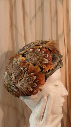 Real fabric hat and feathers vintage late 1940s/ early 1950s main orange/brown colors feathers are pheasant applied on a base of flowery printed fabric typical of the 1950s Degree of conservation B The objects of the past are made to last and have stood the test of time! However, they have been pre-loved and may show small signs of the weather But that's their charm! Anything very obvious will be mentioned! Pheasant Feather, Pheasant Feathers, Feather Hat, Vintage 40s, Pheasant, Small Signs, Orange Brown, Printed Fabric, Brown Color