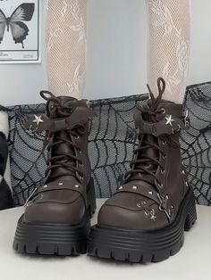 Step into a world of whimsical charm with these platform ankle boots, perfect for those who adore a blend of edgy and cute styles. Featuring a lace-up design, these boots are adorned with an enchanting adjustable strap at the ankle, complete with star-shaped buckles and playful bat wing embellishments. The side zipper ensures easy wearability, while the studded accents add a touch of rebellious flair.Ideal for anyone looking to make a bold fashion statement while embracing their inner kawaii spi Grunge Chunky Platform Lace-up Moto Boots, Grunge Lace-up Chunky Platform Moto Boots, Grunge Lace-up Moto Boots With Chunky Platform, Grunge Platform Lace-up Boots With Round Toe, Alternative Fashion Chunky Platform Lace-up Boots, Grunge High-top Platform Martin Boots, Chunky Platform Lace-up Boots For Alternative Fashion, Alternative Fashion Lace-up Boots With Chunky Platform, Platform Lace-up Boots With Round Toe For Alternative Fashion