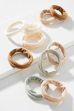 A necessity for braids, ponytails, buns, and more, these snag-free bands keep your hair in place without causing damage. Smiths Rosebud Salve, Rosebud Salve, Anthropologie Holiday, Hair Tie Accessories, Holiday Wishlist, Stocking Stuffers For Her, Tie Crafts, Hair Coils, Head Scarf Styles