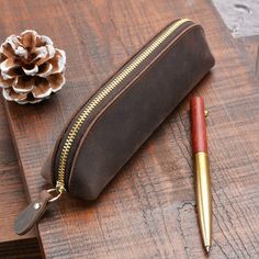 The Paavo Leather Pen Case is made of full grain leather and handmade with meticulous stitching and attention to detail. The Paavo is constructed with the utmost care using top-quality materials. It is the perfect case for protecting and transporting fountain pens, pencils, markers, makeup, or any other writing instrument. The Paavo pen case is made from the highest quality Full Grain Leather that will develop a beautiful patina and is finished with a brass YKK zipper. This pen case is handmade Stationary Pouch, Leather Makeup Pouch, Handmade Stationary, Leather Pen Case, Stationary Accessories, Leather Pencil Case, Handbags For School, Everyday Handbag, Stylish Purse