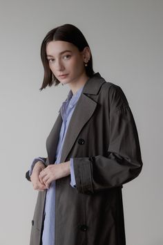 Information The Leora Coat is a minimalist timeless staple that will instantly refine your look. This lightweight double-breasted trench coat features a partial back lining for comfortability, side pockets and adjustable sleeves in an oversized fit. Details Self: 50% Cotton, 50% Rayon Lining: 100% Polyester Double Brea Double Breasted Trench Coat, Charcoal Color, Oversized Fits, Double Breasted, Trench Coat, Winter Fashion, Womens Sizes