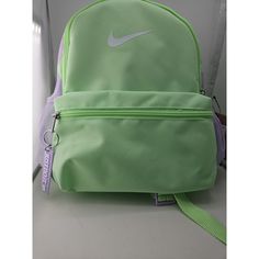 This Nike Brasilia Jdi Backpack Is Perfect For Any Young Athlete Or Student. With A Spacious Main Compartment And Multiple Pockets, It Offers Plenty Of Room For All Their Essentials. The Backpack Features An Adjustable Shoulder Strap And A Zip Closure For Added Security. Made From A Durable Blended Fabric And Accented With The Nike Logo, This Backpack Is Both Stylish And Functional. It Comes In A Vibrant Arctic Orange And White Color Scheme, Making It Perfect For Any Outfit. Whether They're Head White Sports Bag For Back To School, Sporty Green Backpack With Adjustable Strap, Sporty Back To School Bags, White Nike Functional Backpack, Nike White Functional Backpack, Sporty Green Backpack For Back To School, Sporty Green Backpack For School, Sporty Green Bag With Adjustable Strap, Green Sports Bag With Zipper Closure