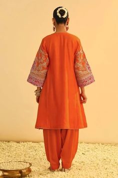 Orange kalidar choga kurta with Kashmiri Tilla embroidery in floral, paisley pattern and gota embellished cutwork border. Paired with pant. - Aza Fashions Traditional Orange Palazzo Set With Dabka Work, Jamawar Anarkali Set For Navratri, Orange Chikankari Embroidery Palazzo Set For Eid, Cotton Silk Palazzo Set With Pallu For Eid, Dabka Chandbali Kurta For Navratri, Fitted Orange Traditional Palazzo Set, Navratri Orange Chikankari Palazzo Set, Fitted Traditional Orange Palazzo Set, Transitional Cotton Silk Palazzo Set With Dabka