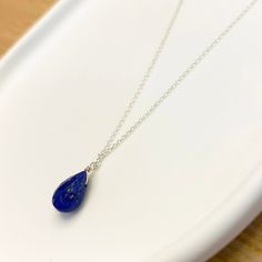 Raw lapis lazuli gemstone necklace. A Genuine Lapis Lazuli Pendant to weaer as a layered necklace or lapis Lazuli choker. ✔️Genuine Lapis Lazuli Necklace✔️ High-Quality  925 Sterling Silver Available with a  24K Gold  Finish This Blue Lapis necklace is a great jewelry gift. It is the perfect gift for your girlfriend, sister, bridesmaids, or even yourself! Made by hand in Greece.     👉A few words about Genuine Lapis Lazuli. Lapis Lazuli is one of the most sought-after stones. Its deep, celestial Sapphire Drop Necklaces For Gifts, Sapphire Drop Necklace For Gift, Blue Adjustable Drop Necklace As Gift, Blue Drop Necklace For Gift, Blue Drop Necklaces For Gifts, Minimalist Blue Teardrop Pendant Jewelry, Minimalist Blue Teardrop Jewelry, Lapis Lazuli Gemstone Beads Necklace For Gift, Blue Teardrop Gemstone Bead Necklaces