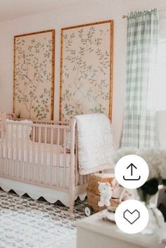 a baby's room with two paintings on the wall and a crib in the foreground