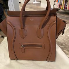 Celine Luggage Tote - Used 1 Time . Cognac Leather. Retails $3,350 Usd. 12 X 12 X 7 In (30 X 30 X 17 Cm) Calfskin Suede Calfskin Lining Gold Finishing Hand Carry Zipped Closure Inner Zipped Pocket And Double Flat Pocket Outer Zipped Pocket On Front Handles With 5 In (12 Cm) Drop Protective Studs On Base Celine Ava Bag Brown, Celine Luggage Tote Bag, Celine Phantom Bag, Celine Micro Luggage, Celine Micro, Celine Tote Bag, Celine Mini Luggage, Celine Tote, Celine Handbags