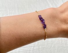 Gorgeous eye catching raw Amethyst chip stones thread in dainty gold or silver chain. Normal bracelet length is 7 inches. Options: Adjustable back 1 inch Ex: If you get a 6in the total length is 6 inch and able to adjust back 1 inch to 5 inch and in between (5-6in) 6 in 7in 8 in 9 in Simple, Dainty, Delicate, yet so Elegant and Romantic. The shine and color are so gorgeous. The picture does not do its justice the piece is so much prettier in person. Perfect for birthday, Christmas, mother's day, Dainty Purple Natural Stone Jewelry, Adjustable Amethyst Beaded Bracelets With Birthstone, Amethyst Gemstone Beads Bracelet For Gifts, Amethyst Gemstone Beads Bracelet As Gift, Amethyst Crystal Bracelet Gift, Amethyst Beaded Bracelet With Birthstone As Gift, Purple Beaded Birthstone Bracelets As Gift, Amethyst Birthstone Beaded Bracelet Gift, Purple Beaded Birthstone Bracelets For Gift