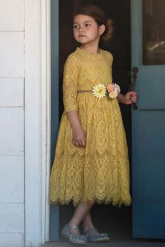 This vintage inspired lace frock is absolutely stunning in person. The color is a dreamy mustard and photographs amazing. The lace is soft, not scratchy and has a French eyelash edging, creating a perfect touch of vintage whimsy. The dress is fully lined with soft cotton and has a back zipper. The daisy floral braided rope belt is completely removable and self ties in back for just the right touch of sweetness. 100% poly self, 100% soft cotton lining. Machine wash, hang dry. Lace Frocks, Girls Fall Dresses, Girls Boutique Clothing, Dress Sash, Online Clothing Boutiques, Dress Belt, Girls Boutique, Toddler Dress