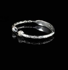 Material: .925 Sterling SilverThickness: .180" -------->About this bangle<---------This is a unique combination of the traditional West Indian Bangle with an Identification plate. The silver wire is marked with the pattern and then the plate is hammered from the middle and shaped by hand. This is a unique feature because the plate is never separate from the bangle and is less likely to break apart than some other bangles that have their plates soldered on. It does take more time and work than to Sterling Silver Stackable Bangle For Anniversary, Adjustable Heirloom Hallmarked Bangle, Adjustable Sterling Silver Bracelet With Intricate Design For Anniversary, Ceremonial Sterling Silver Bangle Bracelets, Sterling Silver Bangle Bracelets For Ceremonial Occasion, Ceremonial Sterling Silver Hallmarked Bangle, Adjustable Etched Sterling Silver Bracelet For Anniversary, Adjustable Hallmarked Sterling Silver Bracelet For Ceremonial Occasions, Ceremonial Sterling Silver Bangle With Intricate Design