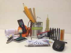 an assortment of office supplies including pens, pencils and markers