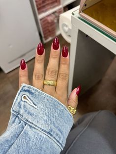 Not your average Christmas nails! From frosty tips to Santa-approved sparkle, these designs are the definition of holiday glam! Red Nails Solid Color, Cranberry Red Nails Acrylic, Cherry Burgundy Nails, Round Nails Vs Almond Nails, Dark Red Glossy Nails, All Red Acrylic Nails, Cherry Cola Red Nails, Cherry Red Fall Nails, Dark Cranberry Nails