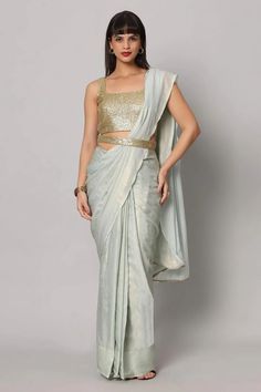 Meera Sea Blue & Gold Shimmer Georgette One Minute Saree Blue Draped Fitted Choli, Blue Fitted Draped Choli, Fitted Draped Blue Choli, Elegant Summer Silk Pre-draped Saree, Elegant Draped Blue Lehenga, Elegant Blue Draped Lehenga, Elegant Draped Blue Sets, Elegant Blue Draped Sets, Glamorous Blue Pre-draped Saree For Party