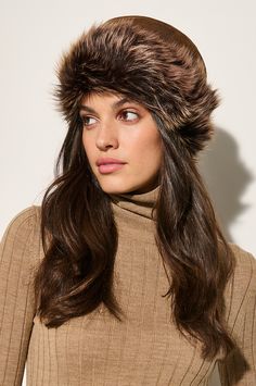 The accessory topping every must-have winter-wear list? A warm hat, of course! Here, super-soft sheepskin and Spanish Toscana sheepskin fur trim combine for a millinery masterpiece. In a traditional pillbox shape that's reminiscent of yesteryear, this stylish hat offers elegant simplicity you'll love for years to come. You'll be able to weather the cold – with this cozy chapeau. Cossack Hat, Promo Gifts, Sheepskin Slippers, Sheepskin Coat, Stylish Hats, Winter Wear, Fur Trim, Leather Coat, Trim