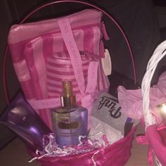 a pink basket filled with personal care items