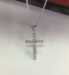 "Metal-----------14k white gold Pure gold not plated Diamond weight-------0.26CT G -----------color VS1, - VS2------- quality Length ---------5.6mm All Natural Diamonds Pendant-------Handmade in USA --14k white gold chain included Available sizes 16\" ,18\" ,20\" inches long Available in 14k yellow gold too" White Gold Cross Pendant With Vvs Clarity, White Sterling Silver Diamond Necklace, White Gold Cross Pendant With Prong Setting, White Gold Cross Pendant Jewelry With Prong Setting, Hallmarked Diamond White Necklace With Round Cut, White Gold Diamond Cross Pendant Necklace For Anniversary, White Gold Pendant Jewelry With Vs Clarity, Dainty Diamond Ring, Engagement Ring Photos