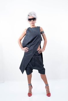 *Below Knee Length*Mid Waist*Snap Buttons*Side Pockets*The Chain Comes With The Pants*Model is 1.64cm (5ft 3") tall, 50 kg (110Lbs) and wears size SmallHere is the tunic:https://www.etsy.com/listing/705887446/denim-tunic-dress-plus-size-dress-plus?ref=shop_home_active_2&pro=1&frs=1SIZE CHARTSIZE XS US/Canada 2 UK 4 Europe 32 Australia 6 Japan 5Bust: around 33 in/84 cmWaist: around 26 in/66 cmHip: around 35.5 in/90 cmApprox height: 5'7"/170 cmSIZE S US/Canada 4/6 UK 6/8 Europe 34/36 Australia 8/1 Edgy Baggy Denim Blue Bottoms, Baggy Denim Bottoms With Edgy Style, Edgy Baggy Denim Bottoms, Non-stretch Edgy Cotton Pants, Edgy Non-stretch Cotton Pants, Summer Cropped Leg Streetwear Pants, Summer Streetwear Cropped Leg Pants, Edgy Denim Blue Pants, Edgy Relaxed Fit Pants For Spring