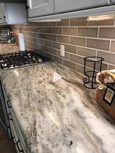 the kitchen counter is clean and ready to be used as a stove top or oven