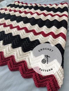 a crocheted blanket on top of a bed with the words crochet written across it