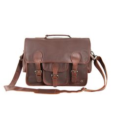 Materials: 100% full grain leather exterior. 100% cotton lining interior. Dimensions: 15L capacity. W41cm x H30cm x D12cm, top handle: L23cm W3cm, extendable shoulder strap: L78cm-L145cm. Hardware: Brass fittings and YKK zippers. Features: 15″ laptop capacity, extendable detachable shoulder strap, top handle, front external pocket, two side external pockets, back zip pocket, two internal compartments, internal zip pocket, zip and buckle fastening to the main compartment. The Harvard Satchel in o Work And Study, City Backpack, Embroidered Initials, Interior Dimensions, Sustainable Leather, Leather Artisan, Brass Fittings, Classic Backpack, Strap Top