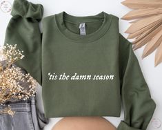 Tis The Damn Season Sweatshirt, Song Lyric Sweatshirt, Christmas Shirt Holiday, New Year Sweatshirt, Christmas Gift, Christmas Hoodie Our top-class designers can design anything you like. Our t-shirt quality is top-notch and can be used everywhere in daily life. These designs are great gifts for family, friends, or coworkers. Our mentality is every t-shirt we create, we make more impact on the world. Premium Quality Printed in the USA. H O W TO O R D E R T S H I R T 1-) Please, Check and Review Cotton Sweatshirt For Fall Holiday, Casual Holiday Sweatshirt For Fall, Relaxed Fit Holiday Sweatshirt For Fall, Casual Green Sweatshirt For Holidays, Green Holiday Sweatshirt For Fall, Fall Holiday Cotton Sweatshirt, Casual Green Holiday Sweatshirt, Green Fall Holiday Sweatshirt, Holiday Green Cotton Sweatshirt