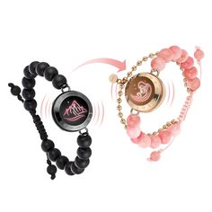 two bracelets, one with a compass and the other with a pink beaded necklace