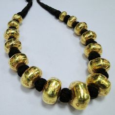 22 K gold Large beads Necklace. Handmade beautiful hollow Gold beads filled with wax inside to give more striength and durablity. Good for wear as is or for your own creation. Length-27 cm ( free size easy to adjust length by pulling the toggle), size of center bead-15/20 MM, Weight-77 grams. Material-22 K gold. Mangalsutra Pendant, Large Bead Necklace, Large Beads, Gold Pendant Jewelry, Necklace Beads, Amulet Necklace, Engraved Design, Gold Bead Bracelets, Traditional Modern