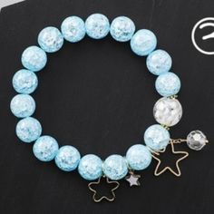 Light Blue Crystal Star Stretch Bracelet Brand New, Never Worn Metal: Zinc Alloy Fits All Blue Adjustable Charm Bracelet For Party, Adjustable Blue Charm Bracelet For Party, Adjustable Blue Charm Bracelet For Parties, Casual Star-shaped Jewelry For Parties, Blue Star Charm Bracelet, Blue Charm Bracelet For Party, Trendy Blue Beaded Bracelets For Party, Blue Star-shaped Jewelry With Colorful Beads, Star-shaped Beaded Party Bracelets