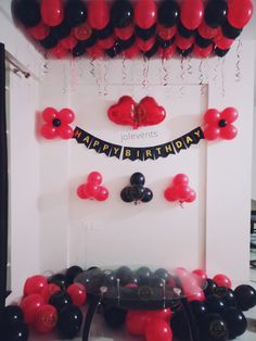 a birthday party with balloons and streamers