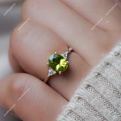 Gemstone : Natural Peridot Metal : 9K Gold / 14K Gold / 18K Gold / 925S Silver Gemstone Shape and Size : Oval 9x7 MM Gemstone Shape and Size :Trillion 3.00 MM Gemstone Weight : 2.50 Cts Metal Weight :  3.00 Gram ACCEPT CUSTOM SERVICE: 1. Accept change main stone type, size : Oval 9x7 MM 2. Accept change other material : This jewelry can also be made in solid gold (14K white/rose/yellow gold...) Please contact me if you have special requests. Thanks for your visiting! 14k Gold Green Rings With Accent Stones, Green 14k Gold Ring With Accent Stones, Green 14k Gold Promise Ring, Green 14k Gold Rings With Accent Stones, Green 14k Gold Birthstone Ring With Accent Stones, Green Diamond Ring With Accent Stones In 14k Gold, Peridot Three Stone Ring, Promise Ring With Peridot In Round Shape, Green Peridot Ring For Promise