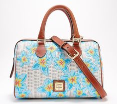 Covered in a fresh, floral design, this coated cotton satchel feels just right for spring. Carry it by the top handles or wear it crossbody with the adjustable strap for hands-free convenience. From Dooney & Bourke. Spring Satchel With Detachable Strap For Daily Use, Daily Use Satchel With Detachable Strap For Spring, Spring Satchel With Top Handle And Leather Handles, Spring Top Handle Satchel With Leather Handles, Floral Print Satchel For Everyday Spring Use, Spring Floral Print Satchel For Everyday Use, Spring Floral Print Crossbody Bag, Spring Bags With Leather Handles And Coated Canvas, Spring Bag With Leather Handles And Coated Canvas