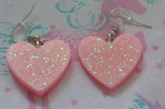 Pink dangly resin heart earrings with green iridescent fine and chunky glitter. Clay Coquette, Pink Heart Earrings, Girls Stuff, Neon Aesthetic, Heart Crafts, Gothic Jewelry, Easy Workouts, Heart Earrings, Pink Heart